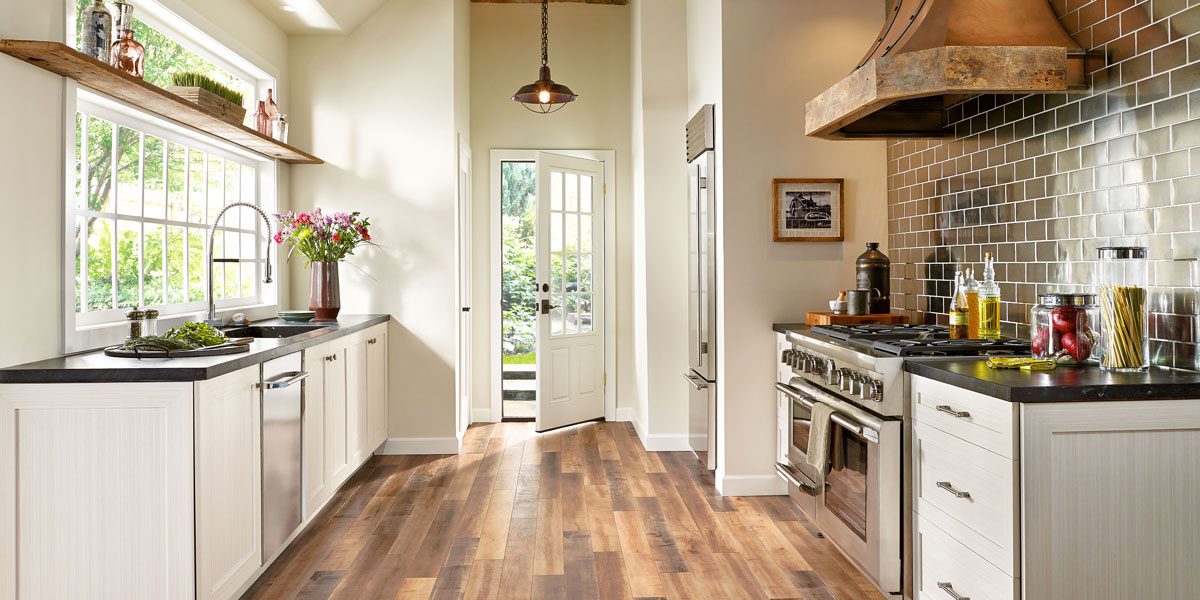 Dark Hardwood Flooring In a Kitchen by Bode Floors